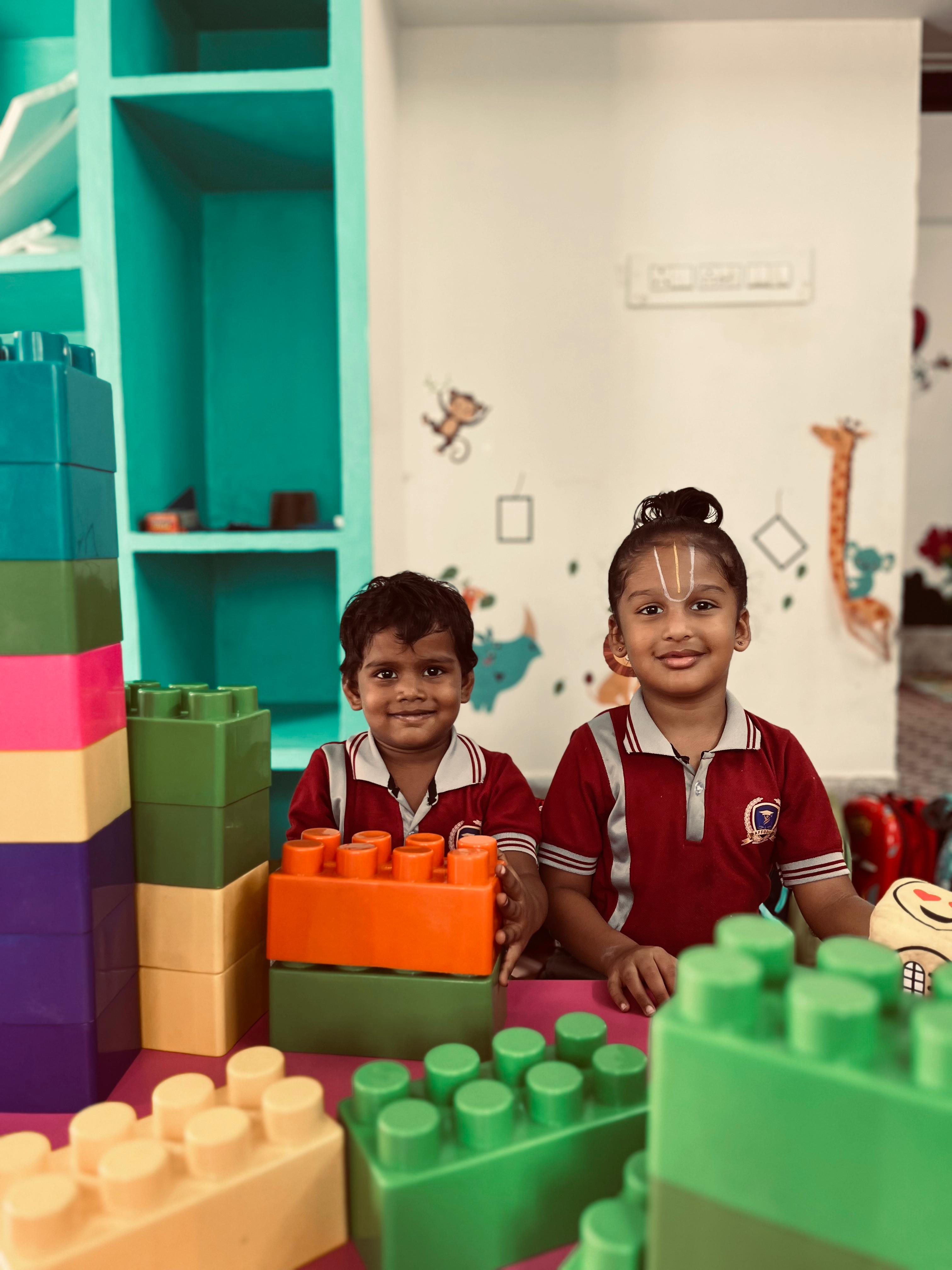Students learning with building blocks